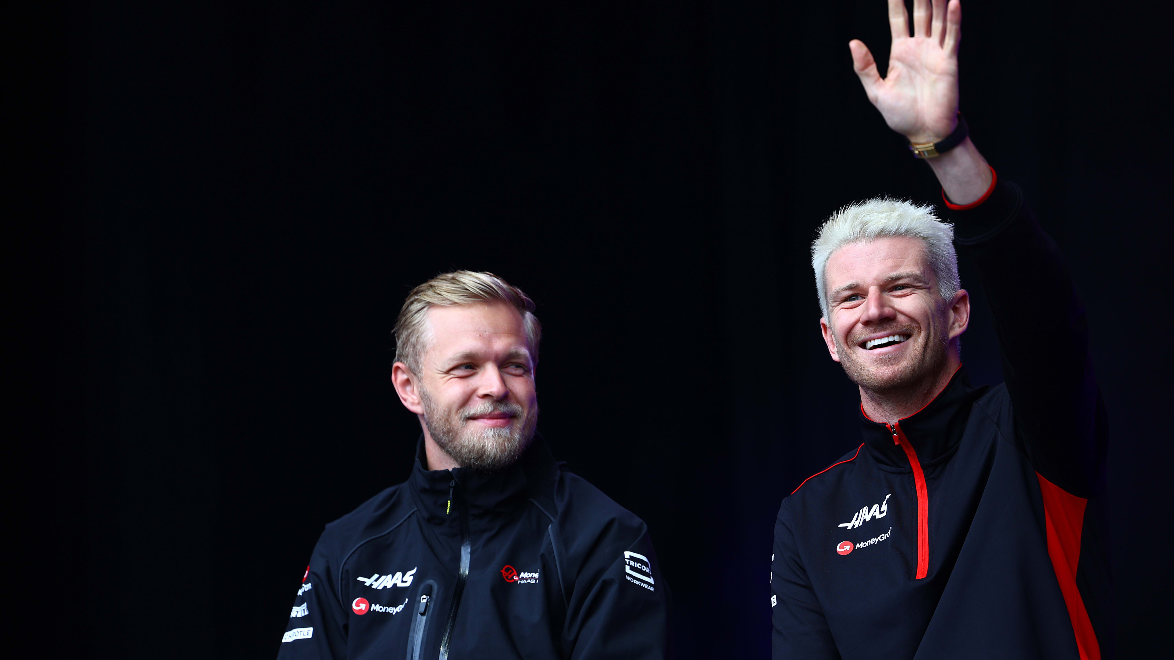 SPA, BELGIUM - JULY 29: Kevin Magnussen of Denmark and Haas F1 and Nico Hulkenberg of Germany and