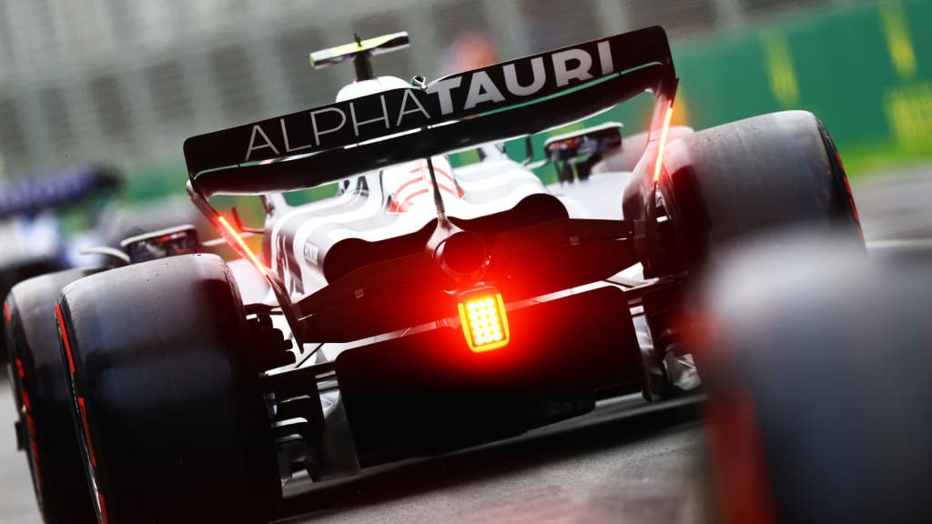 SPA, BELGIUM - JULY 28: Daniel Ricciardo of Australia and Scuderia AlphaTauri and Yuki Tsunoda of
