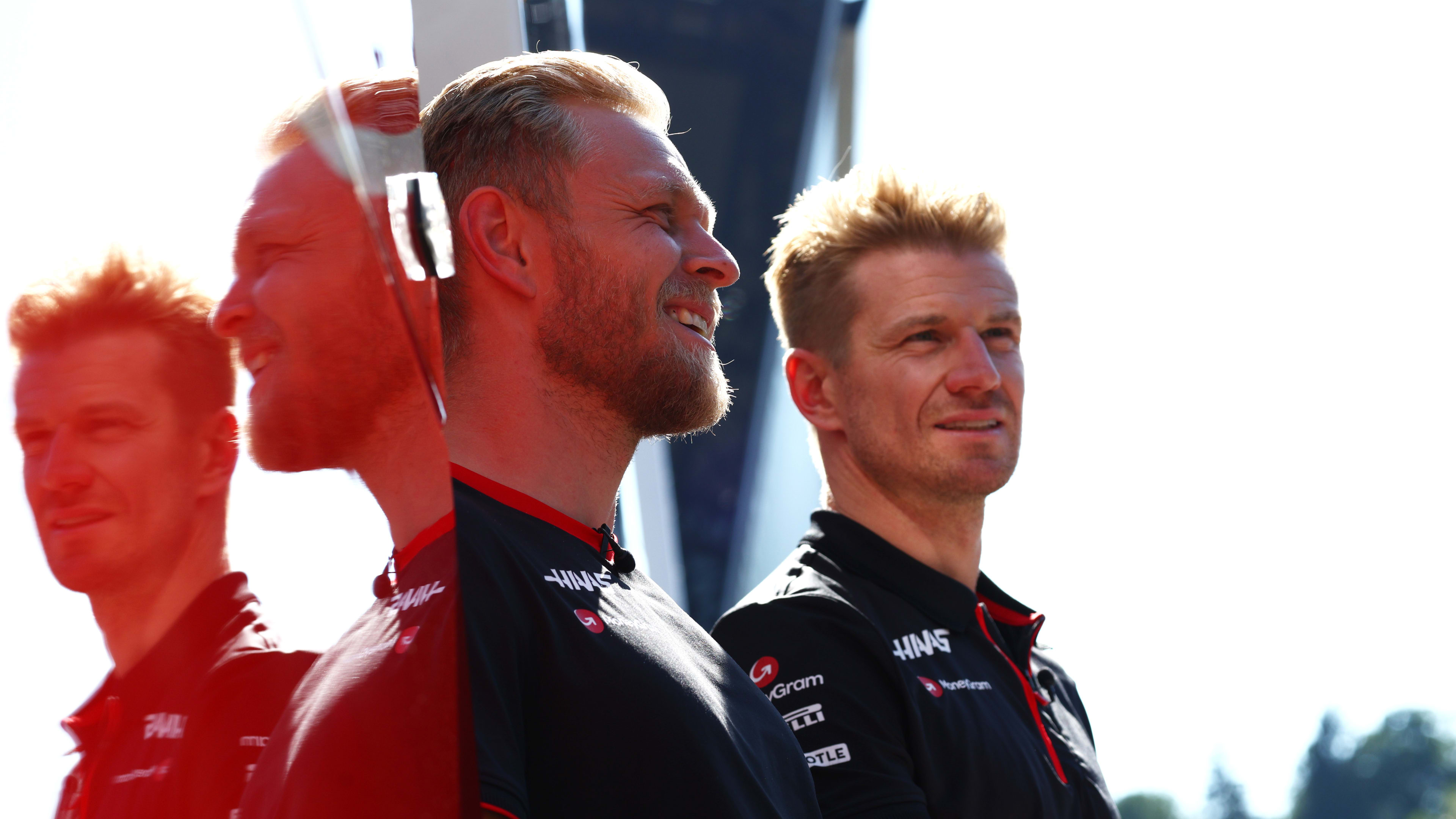 SPIELBERG, AUSTRIA - JUNE 29: Kevin Magnussen of Denmark and Haas F1 and Nico Hulkenberg of Germany